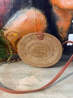 Round Woven Straw Crossbody Bag with Tan Leather Trim